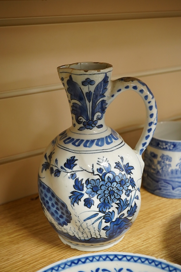 An 18th century Delft jug, another tin glazed dish, a Worcester Hanbury dish and five pieces of Copeland Spode Italian blue and white, tallest 22.5cm